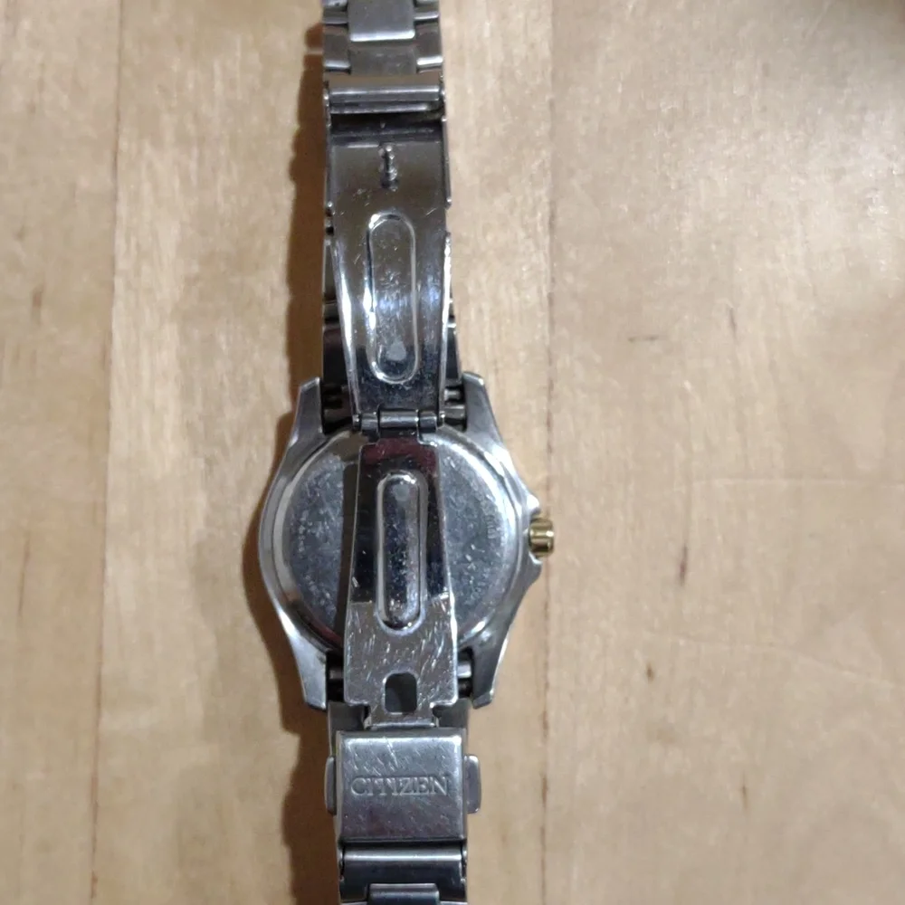 Citizen Eco-Drive silver with gold and rhinestone accents